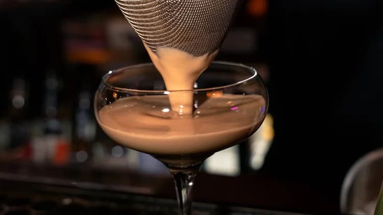 Cocktail being poured